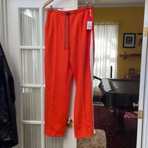 orange and white hunter track pants, never been worn